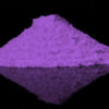 A pile of dark purple glow in the dark pigment powder