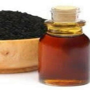 Black Cumin Seeds in bowl and black cumin seed oil in glass jar