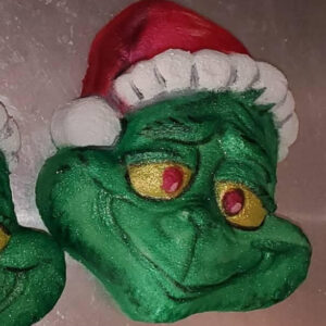 grean and red grinch shaped soap