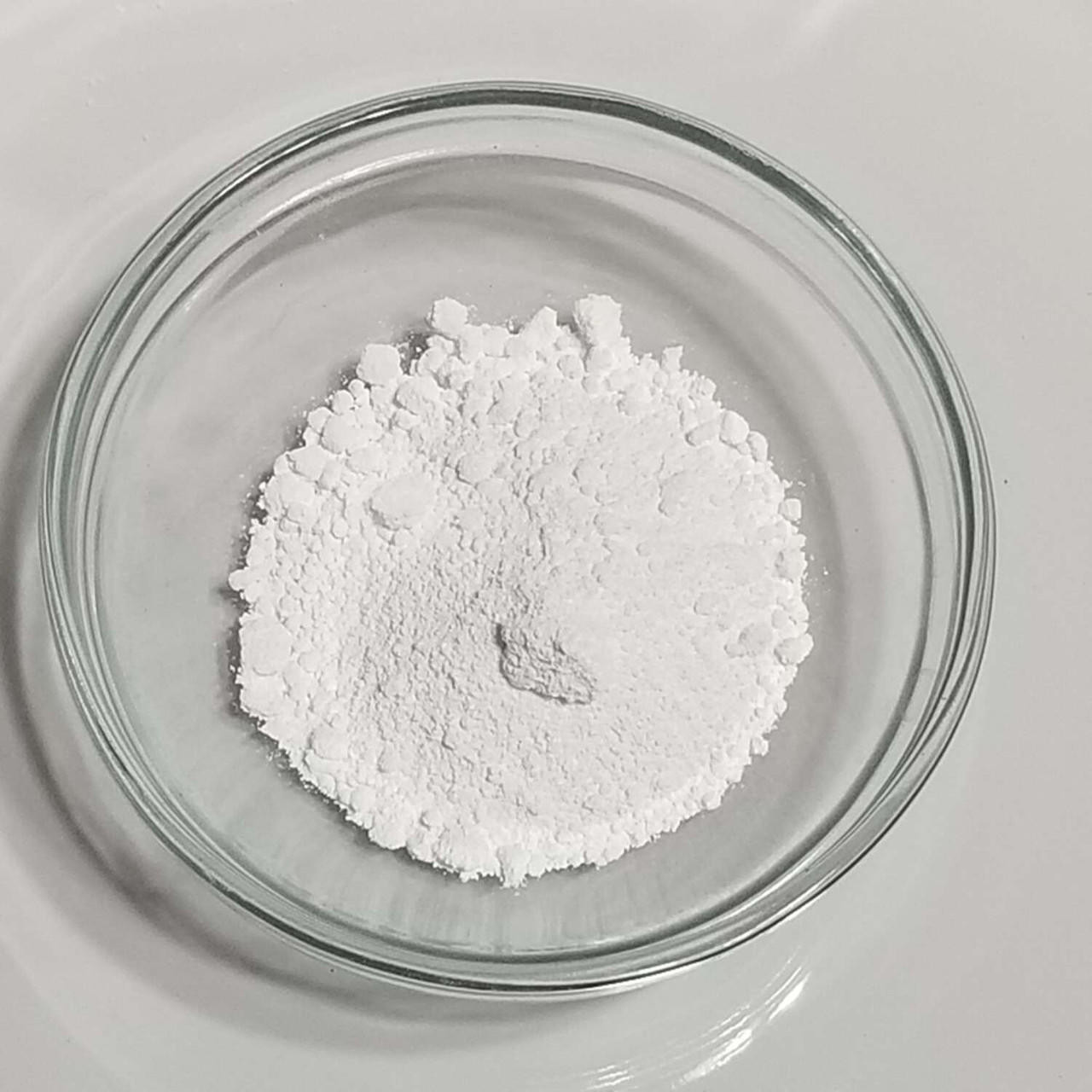 Titanium Dioxide powder in a bowl