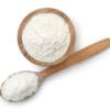 Bioterge AS90 Powder in wooden bowl and spoon on white background